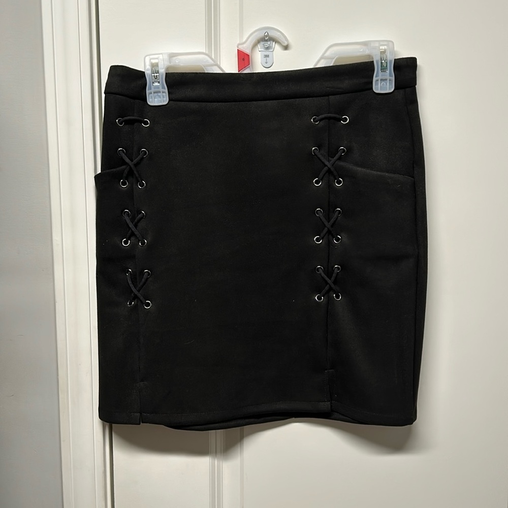Black suede with Kris Kross, accent and pockets.